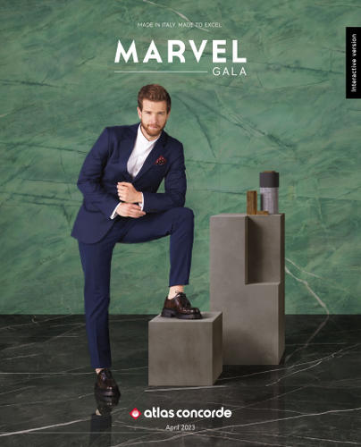 Copertina del catalogo Atlas Concorde Marvel Gala con parete effetto marmo verde e modello