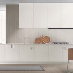 Cucina bianca lineare con isola, tavolo e sospensione a soffitto