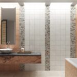 Bagno con doppio lavabo su mensola, rivestimenti chiari e scala portasciugamani