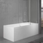 Bagno con specchio circolare retroilluminato, mensola e lavabo sospeso