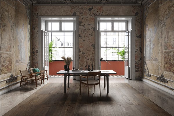 Sala da pranzo in un loft con pareti in pietra e pavimento in legno