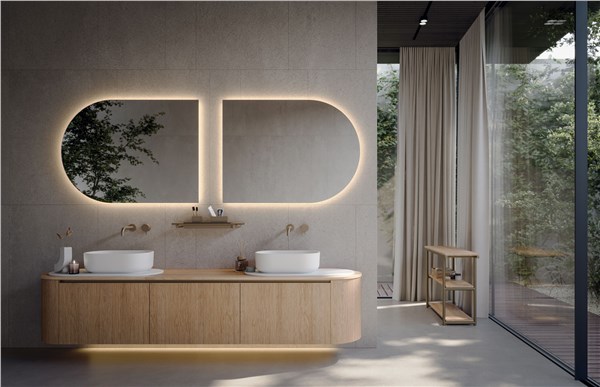 Bagno con mobile in legno curvo, doppio lavabo e specchi retroilluminati