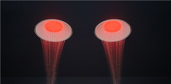 Due soffioni doccia con getto illuminato di rosso su fondo nero
