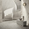 Scala a chiocciola bianca, pavimenti e pareti in terrazzo, tavolo scultoreo, lampada da parete e rivestimenti Ceramica Del Conca.